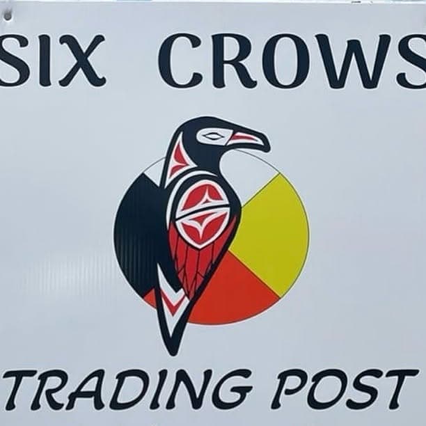 The Six Crows Trading Post sign